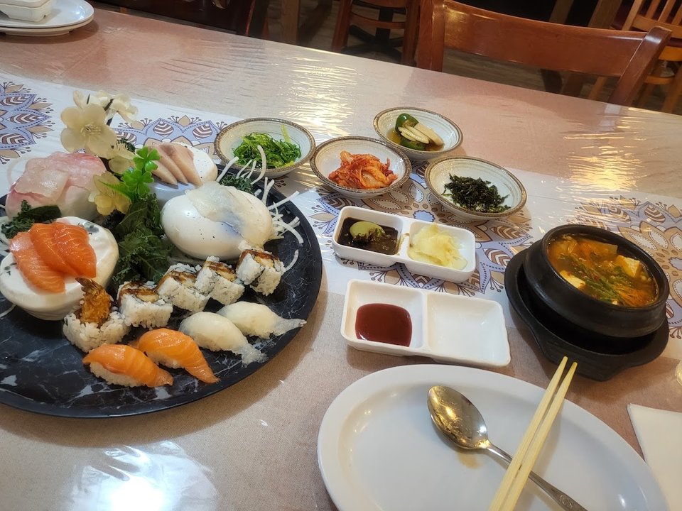 Fresh seafood plates on a simple table.